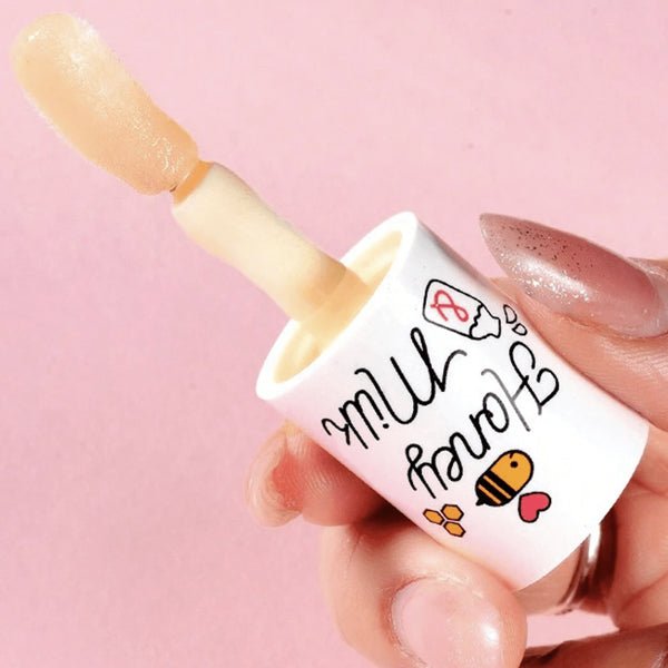 Barojoša lūpu eļļa a persiku aromātu | A’pieu Honey & Milk Lip Oil, Peach - KOORE