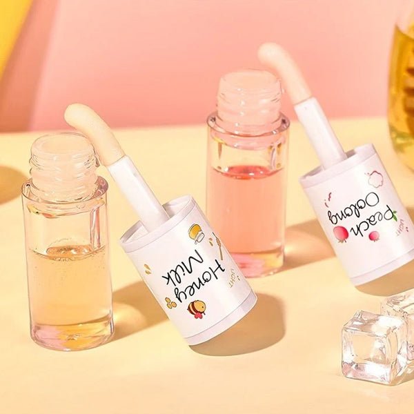 Barojoša lūpu eļļa a persiku aromātu | A’pieu Honey & Milk Lip Oil, Peach - KOORE